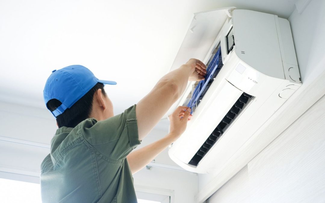 HVAC technician servicing a ductless mini split in Lodi