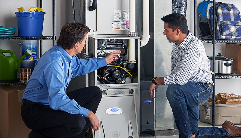 Technician evaluating a furnace for repair or replacement in Lodi