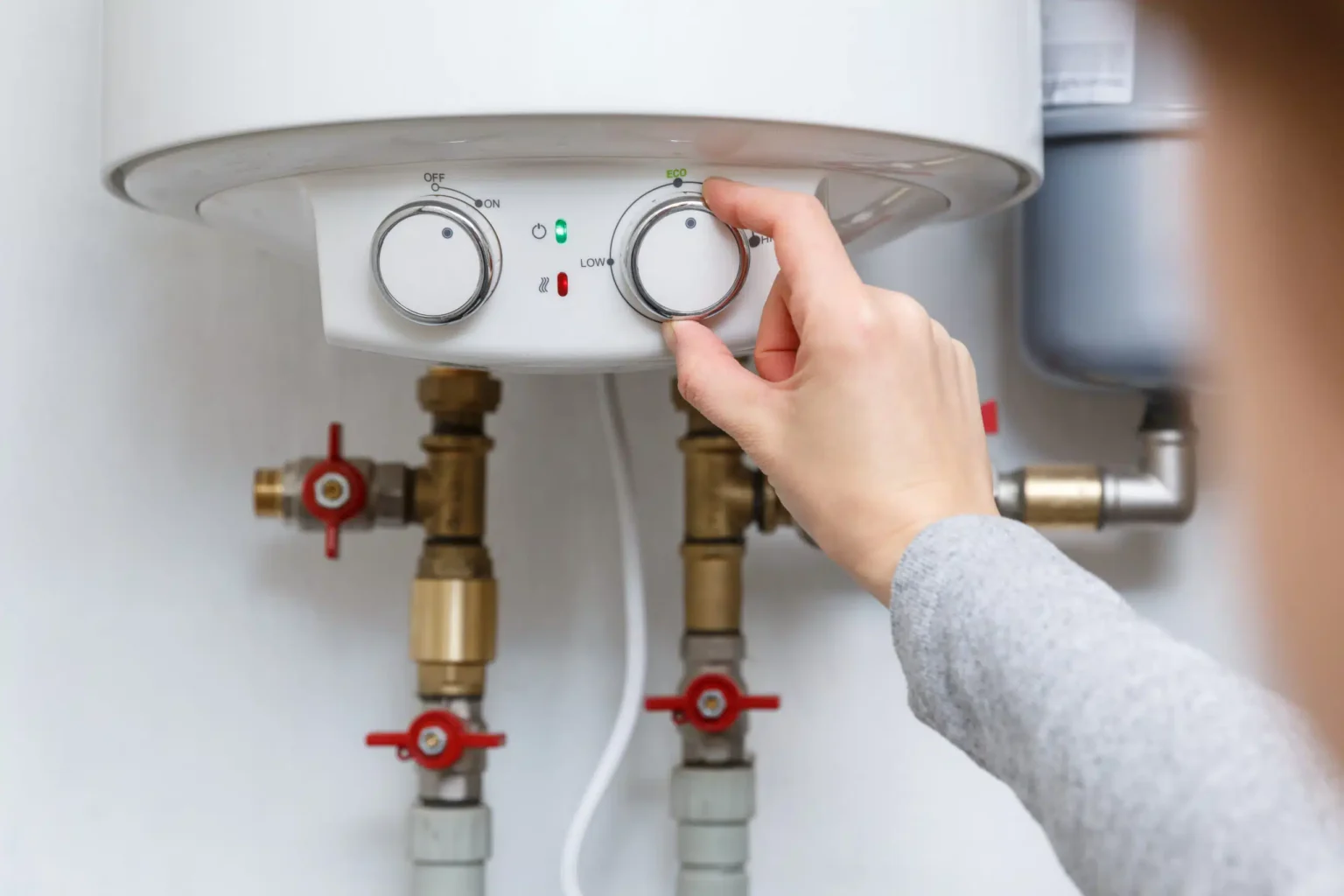 Technician adjusting a water heater in Lodi